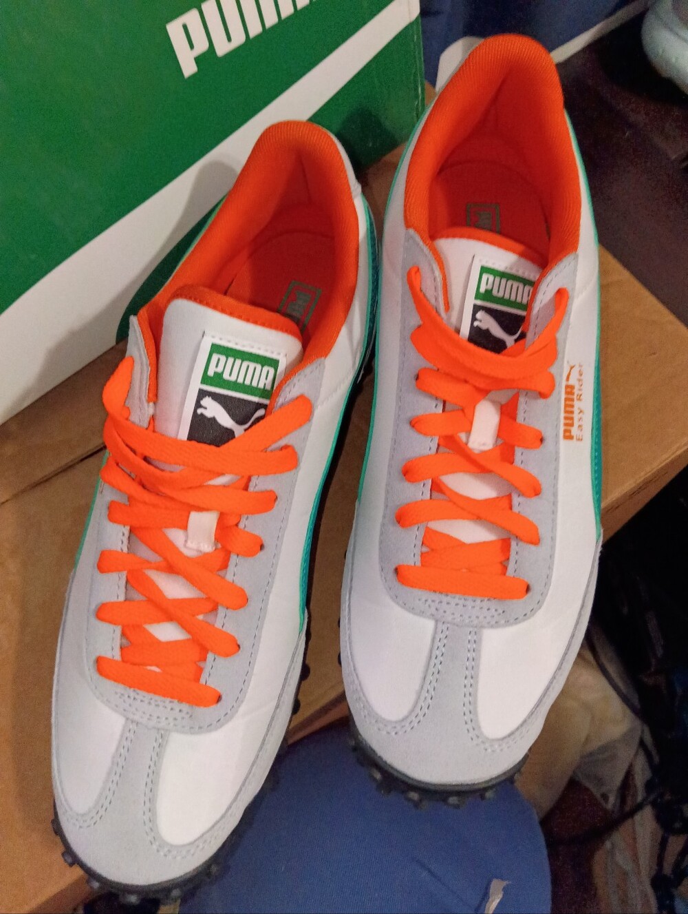 Puma White Sneakers with Bright Orange Accents